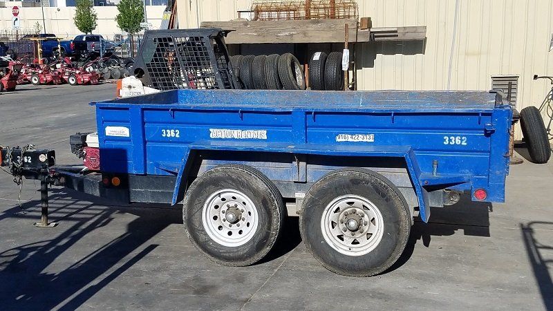 Woman on Tractor — Sacramento, CA — Action Rentals