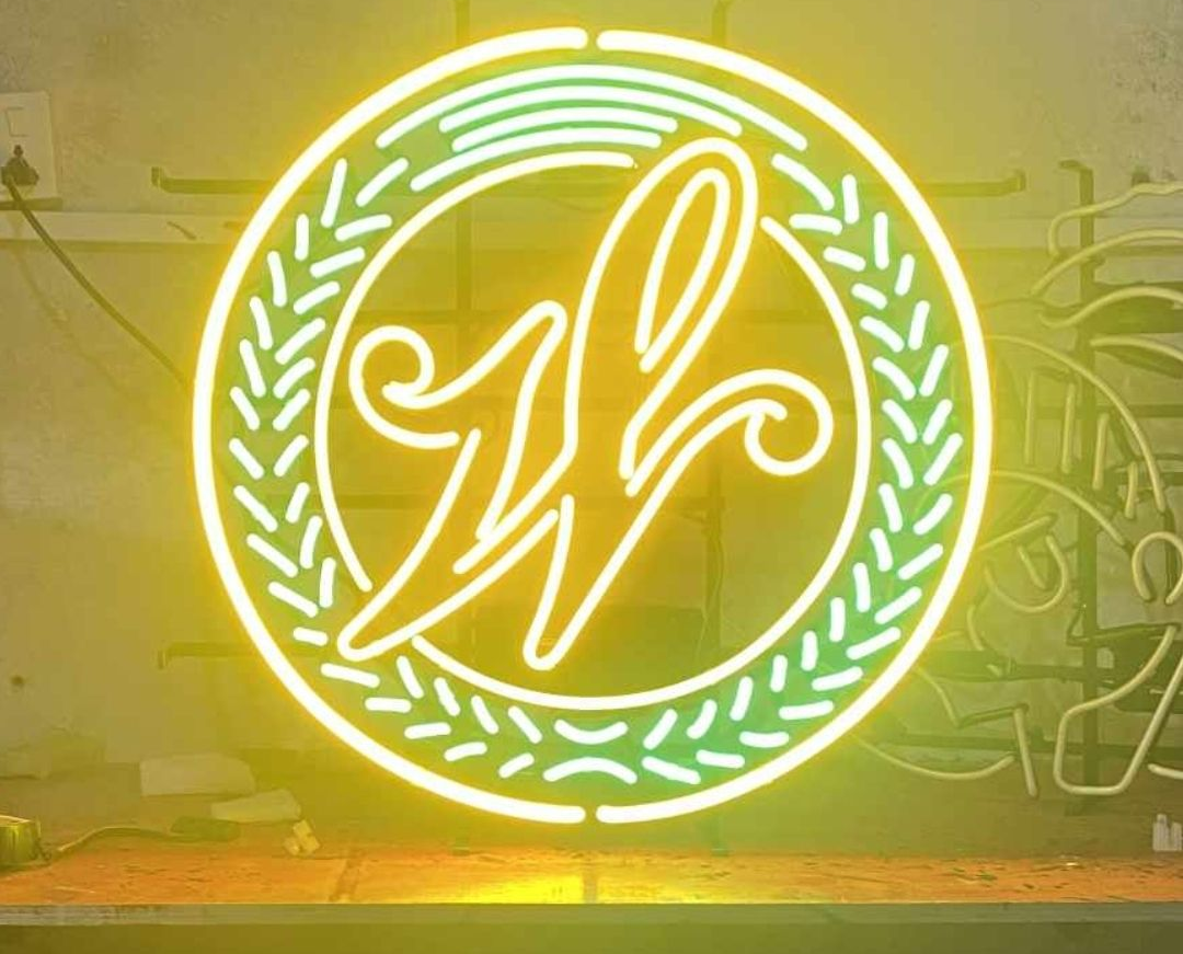 Neon sign with stylized 