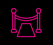 Pink line drawing of a red carpet with stanchions, on a black background.