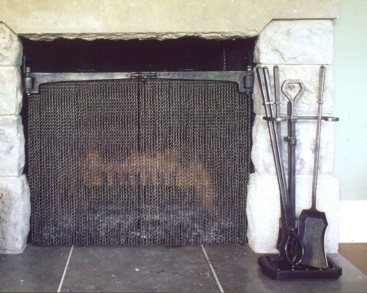 custom made fire screen with fireplace tools