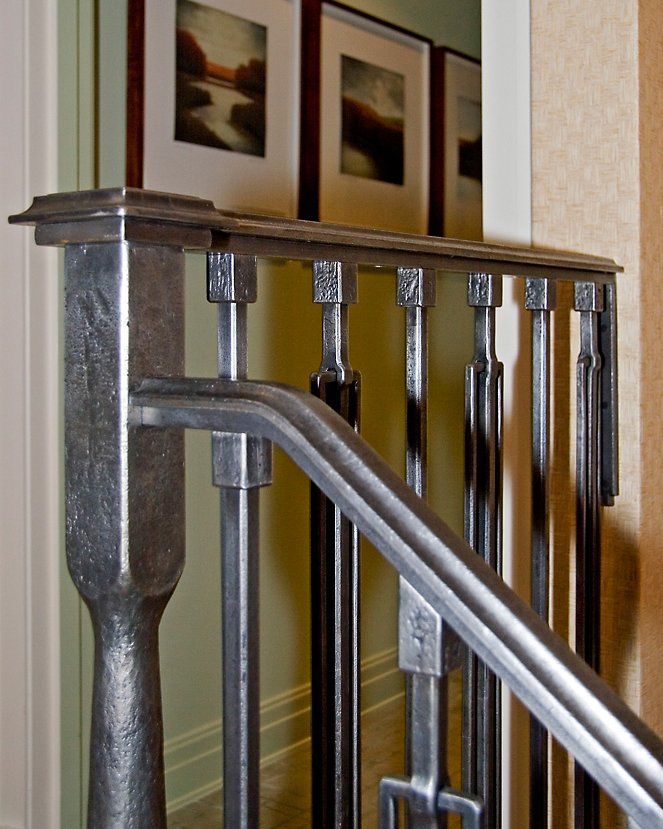 custom iron stairwell banister detail