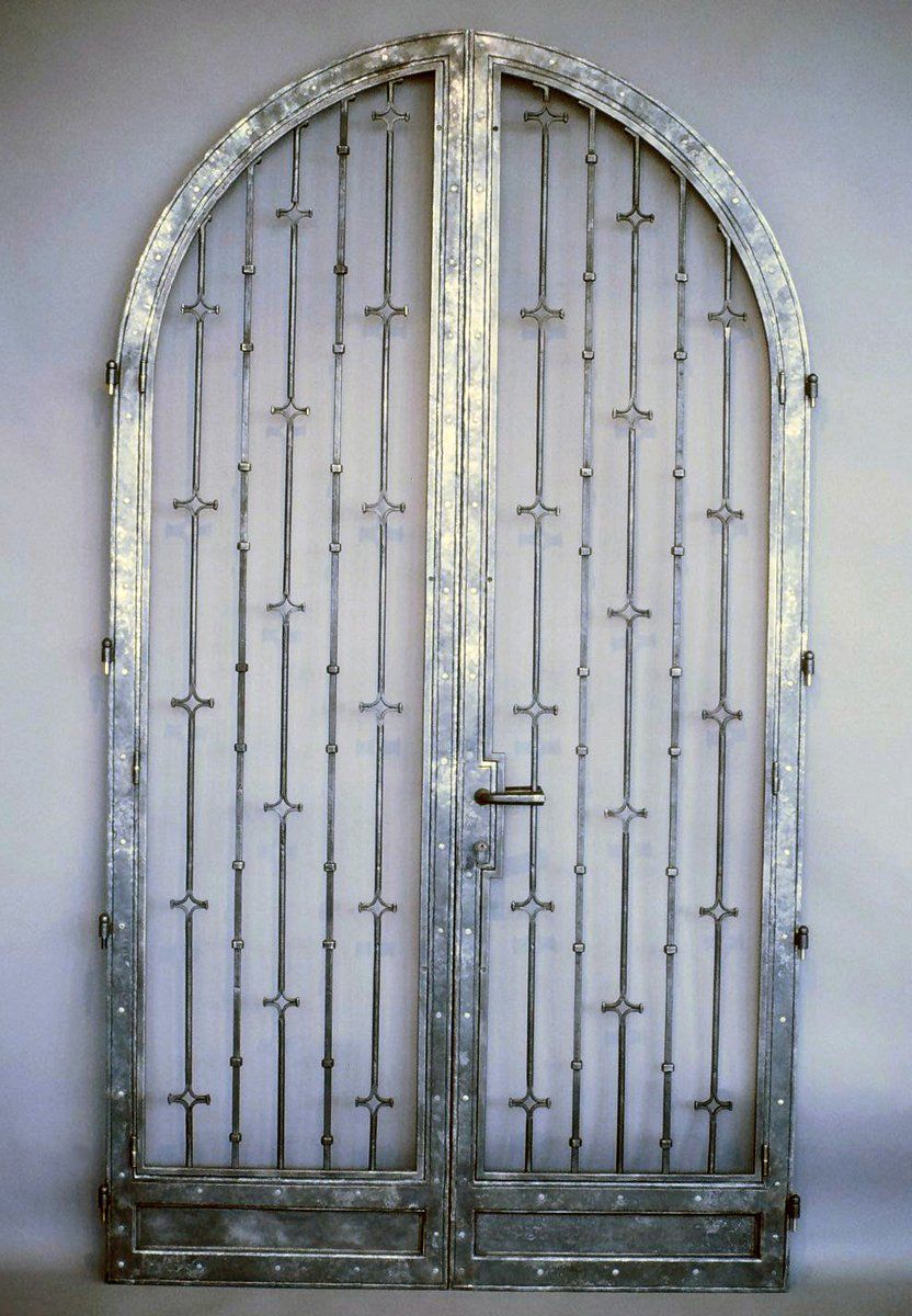 designer hand forged ironwork wine cellar entry