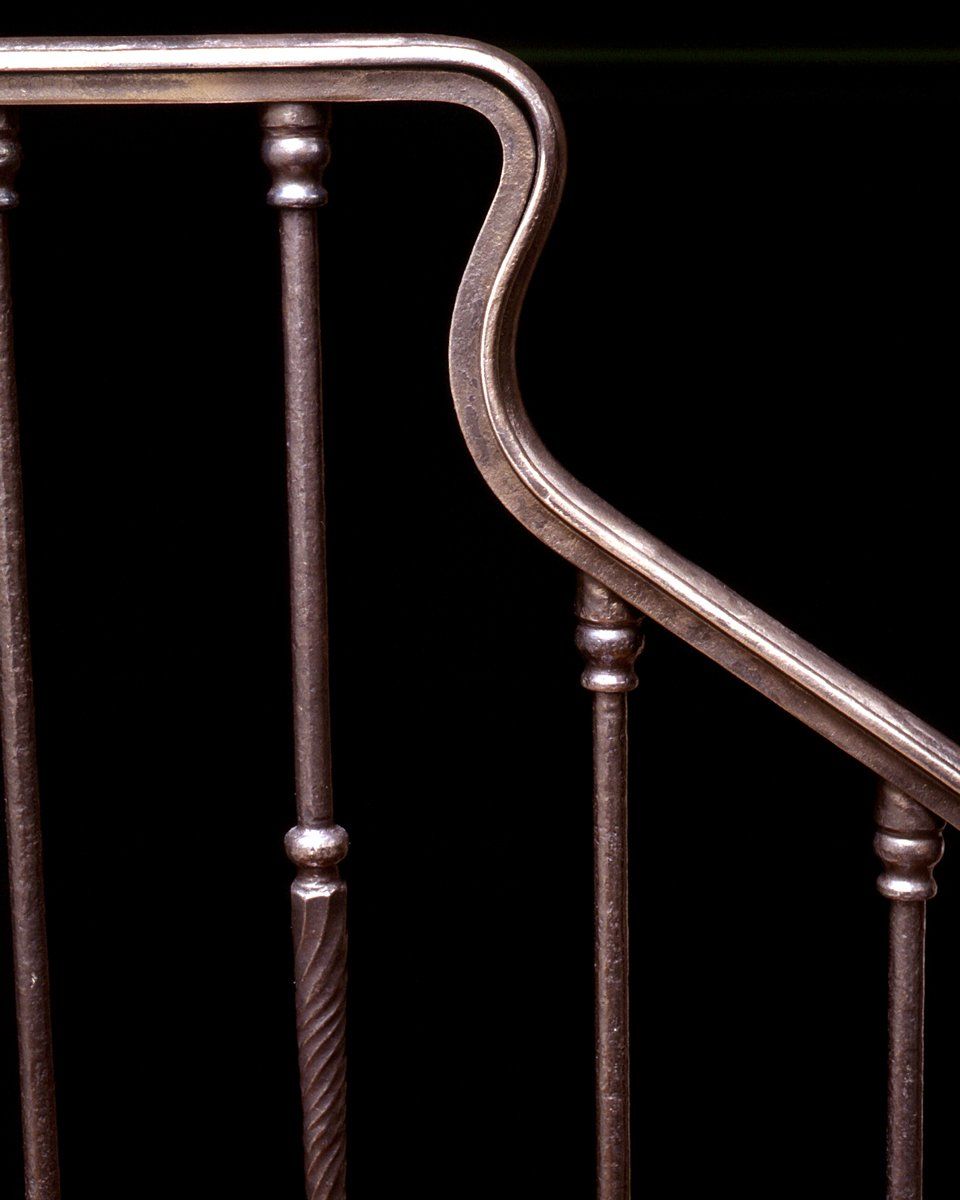 forged iron stairwell banister
