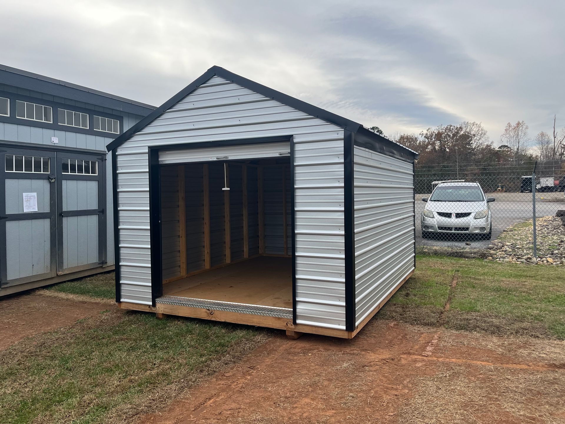 10x12 Metal Storage w/Electric (REPO)