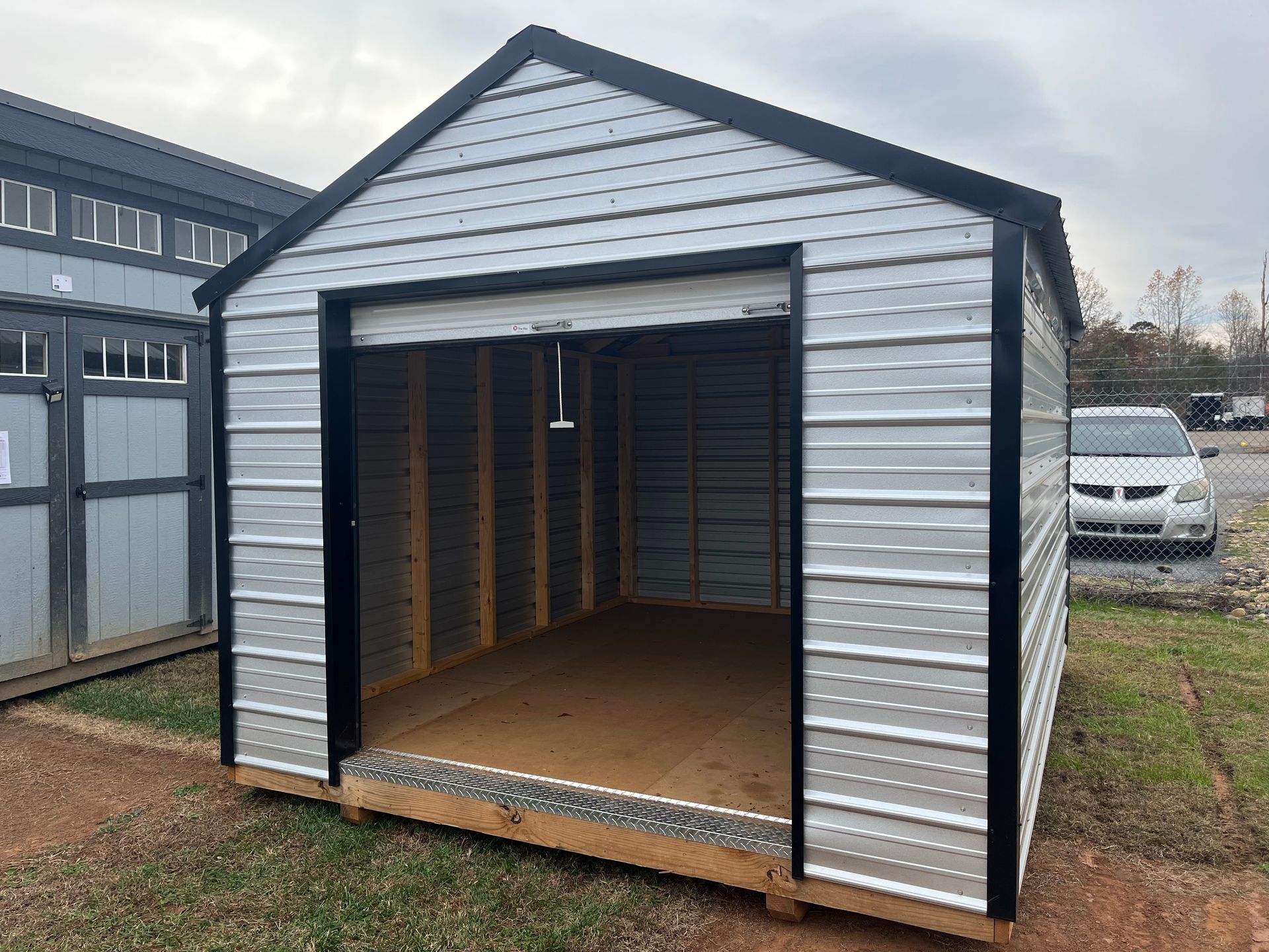 10x12 Metal Storage w/Electric (REPO)