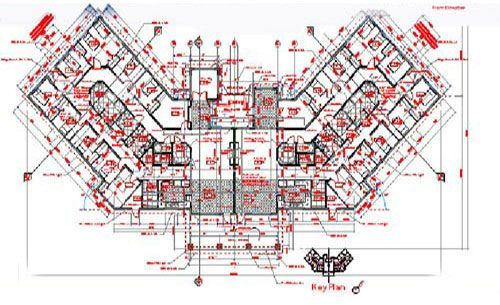 Architectural blueprint: a multi-story building plan with various rooms, lines, and symbols in red and blue.