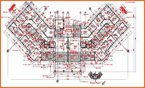 Architectural floor plan of a multi-story building, detailed with rooms, lines, and annotations in black and red.