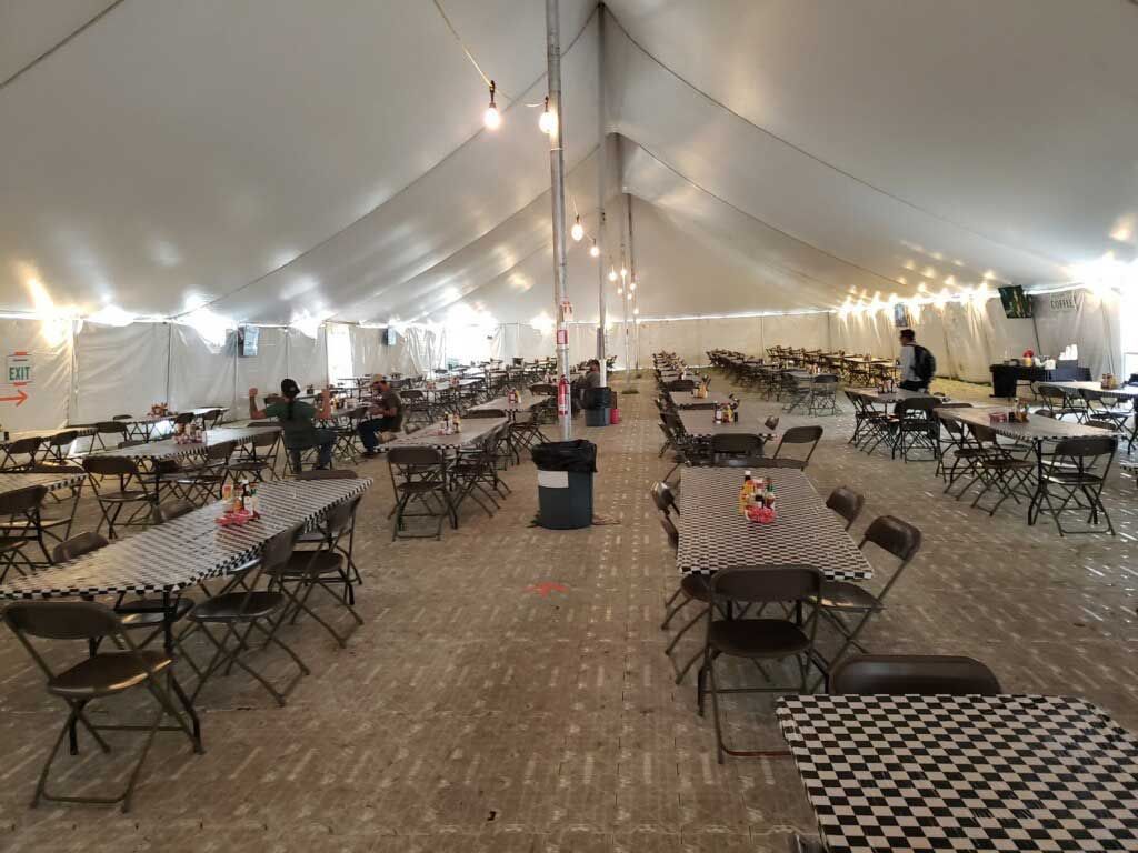 Interior disaster relief cafeteria area under tent