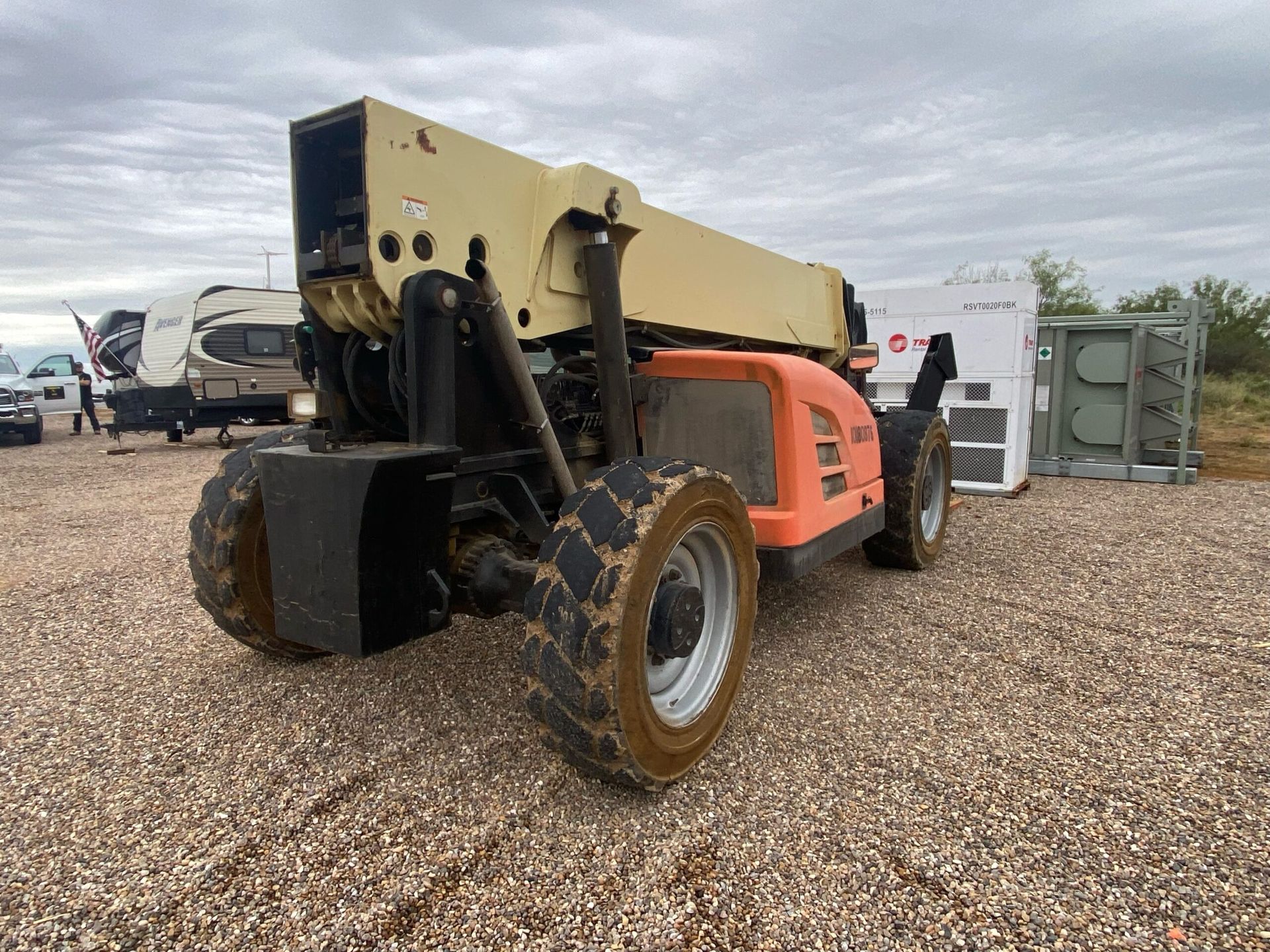 Equipment being used to unload temporary hvac and power generators.
