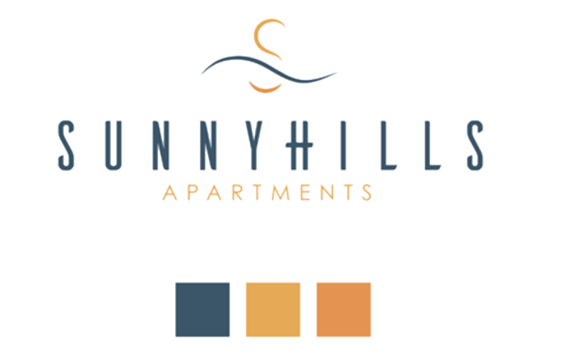 Logo for Sunnyhills Apartments: blue text and emblem over "Sunnyhills," colors include blue, orange, and gold.