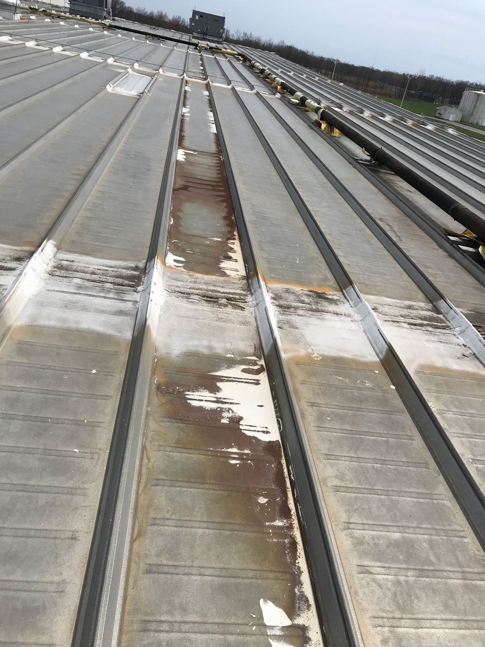 Long Roof with Rust — Hickory, NC — BDR Construction & Consulting