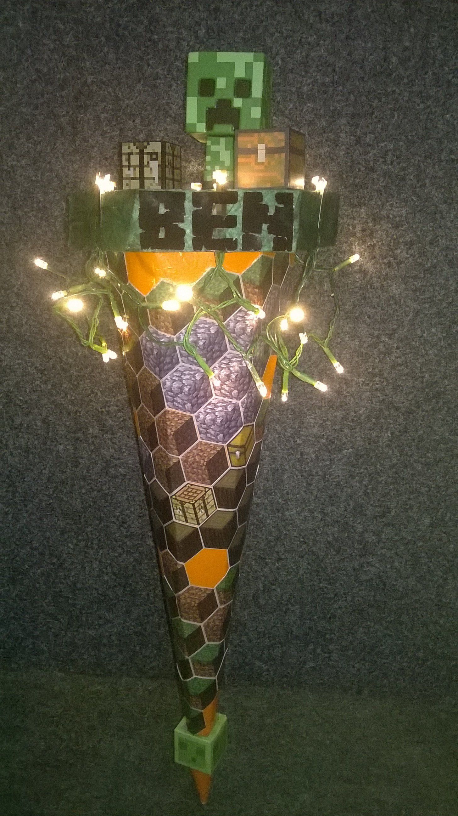 Ein Kegel mit einer Kletterpflanze darauf und dem Namen Ben darauf.