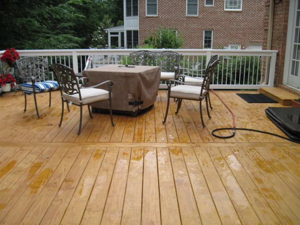 Wooden Deck with Chairs — Poquoson, VA — OutBack Construction