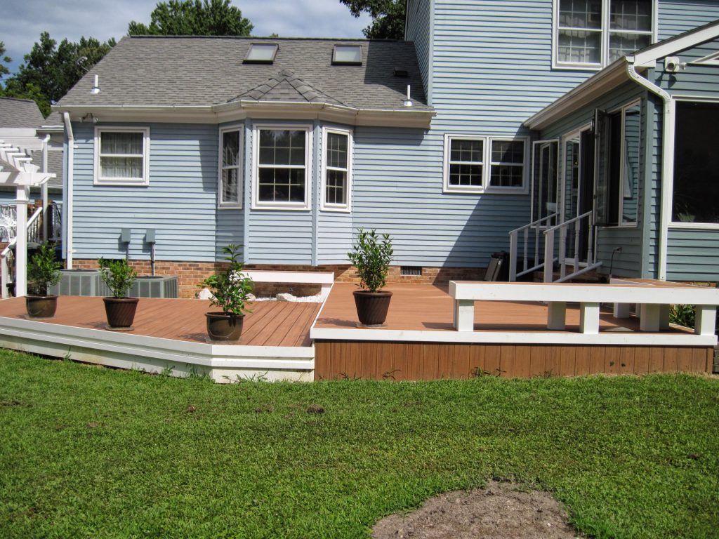 Blue House with Wooden Deck — Poquoson, VA — OutBack Construction