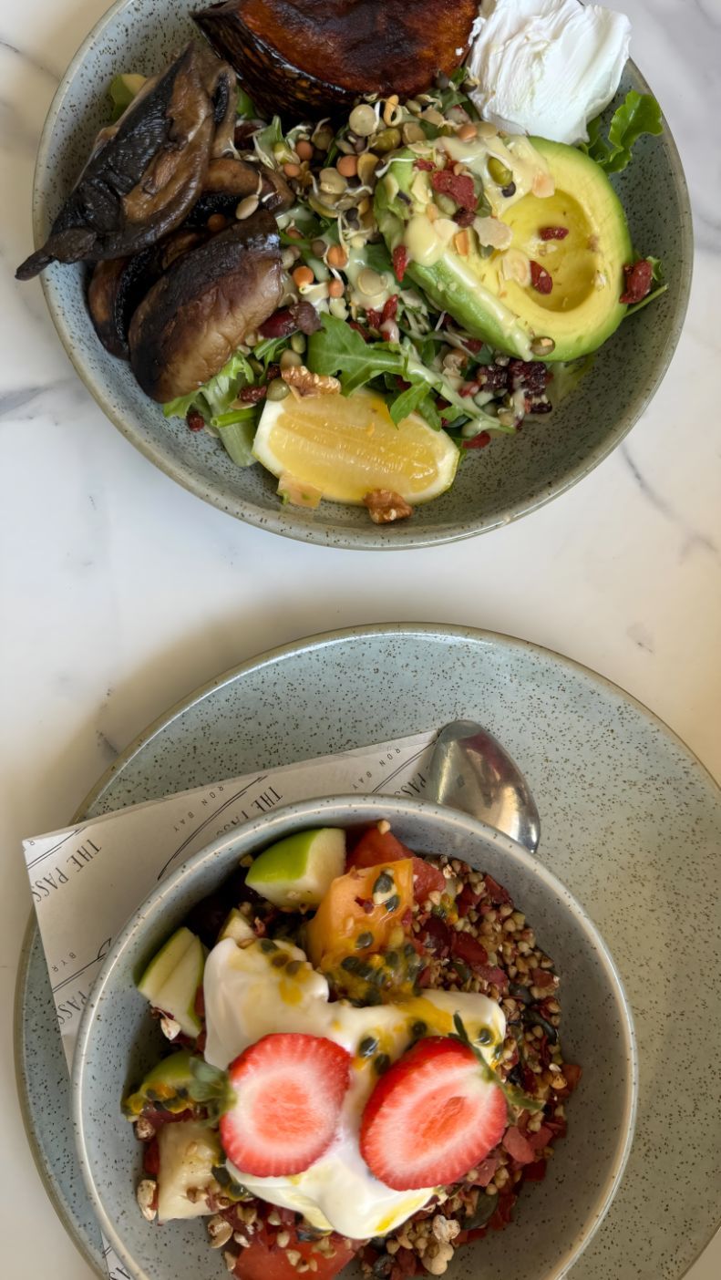 Two Plates of Food and A Bowl of Food on A Table — The Pass Cafe In Byron Bay, NSW