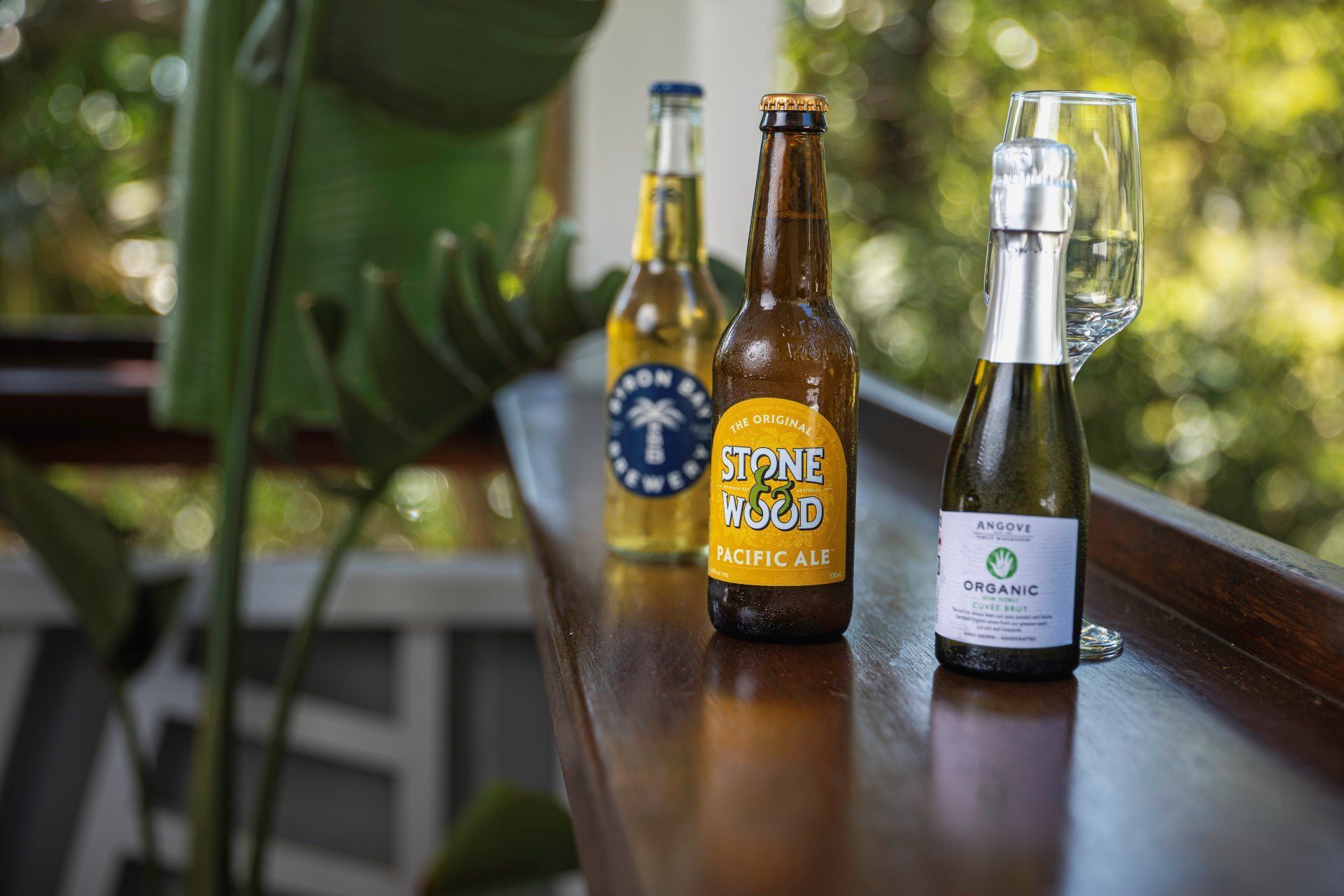 A Variety Of Bottles On A Bar — The Pass Cafe In Byron Bay, NSW