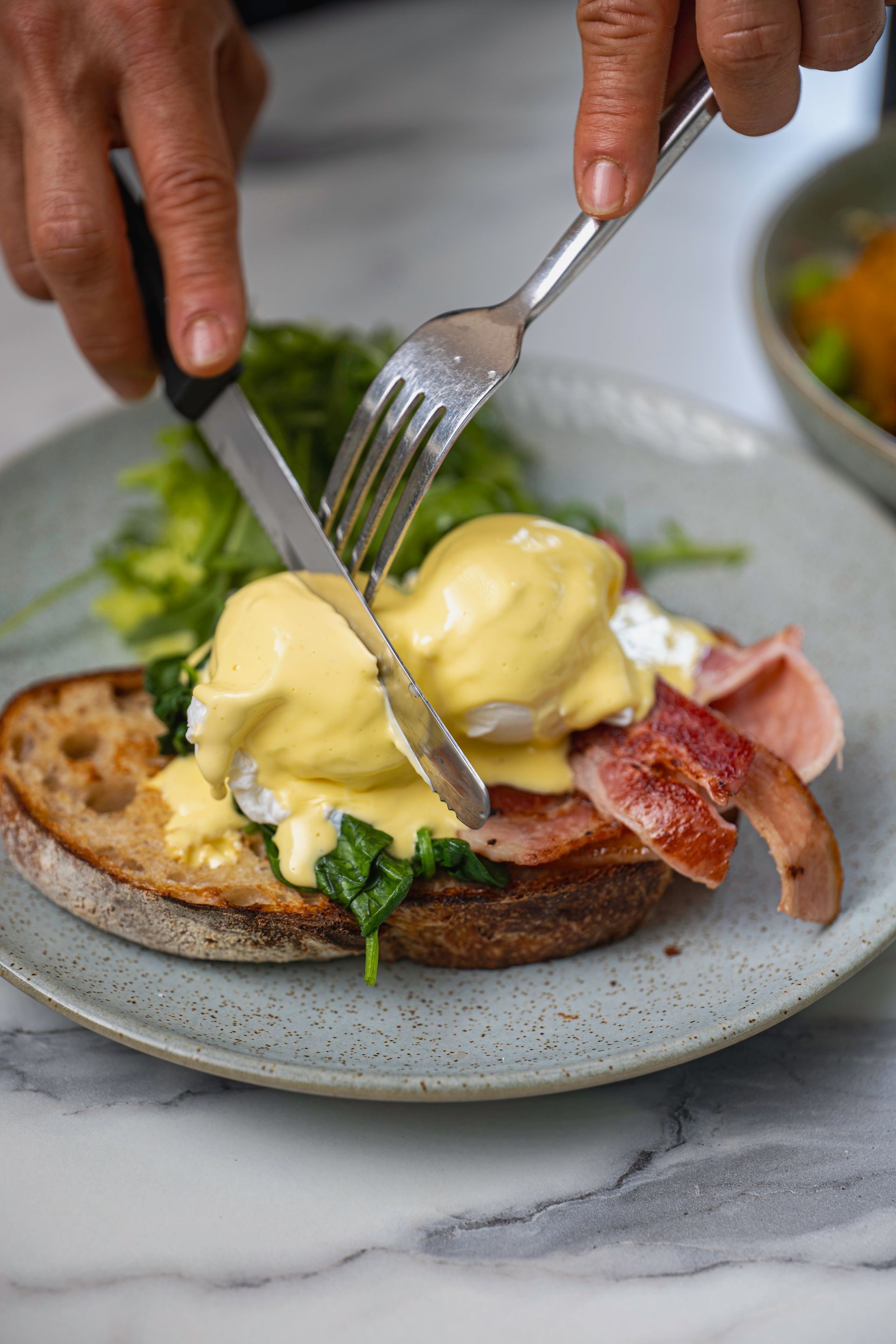 Eggs Benedict On Sour Dough Toast— The Pass Cafe In Byron Bay, NSW