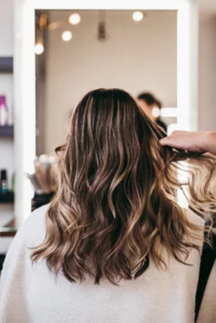 “Smooth blowout and volume styling at Looks by Lovato Sandy Utah”