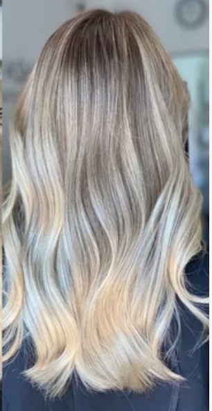 “Soft blonde balayage and highlights at Looks by Lovato Sandy Utah”