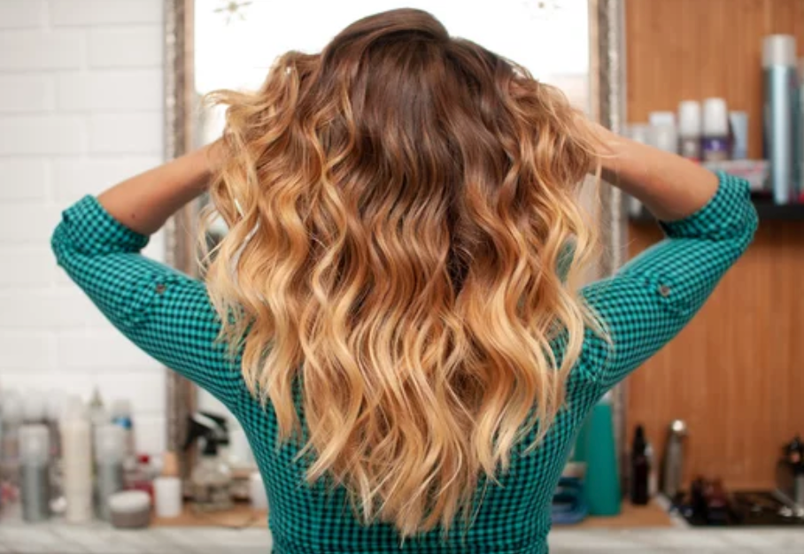 “Defined curly hairstyle finished with conditioning treatment in Sandy Utah”