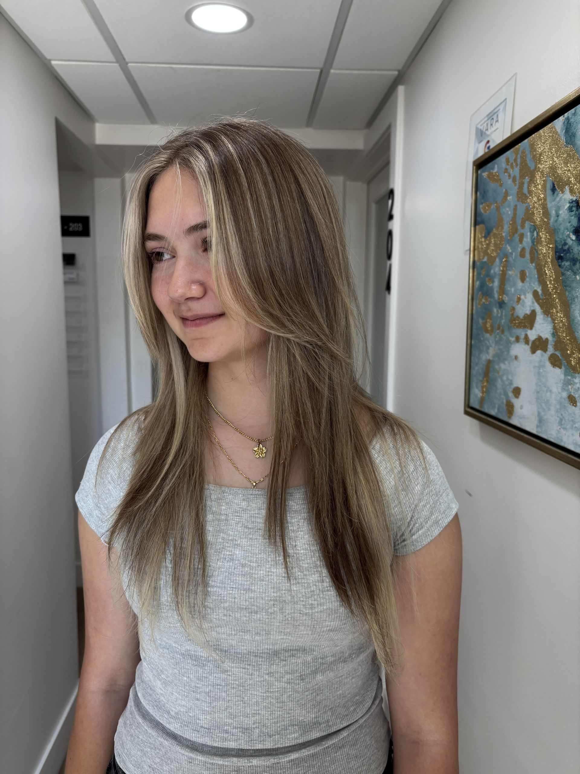 “Happy client after hair service at Looks by Lovato salon in Sandy Utah”