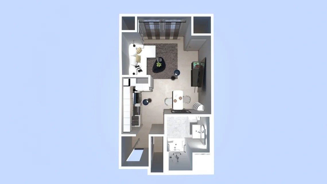 Overhead view of a modern studio apartment floor plan with kitchen, living area, and bathroom.