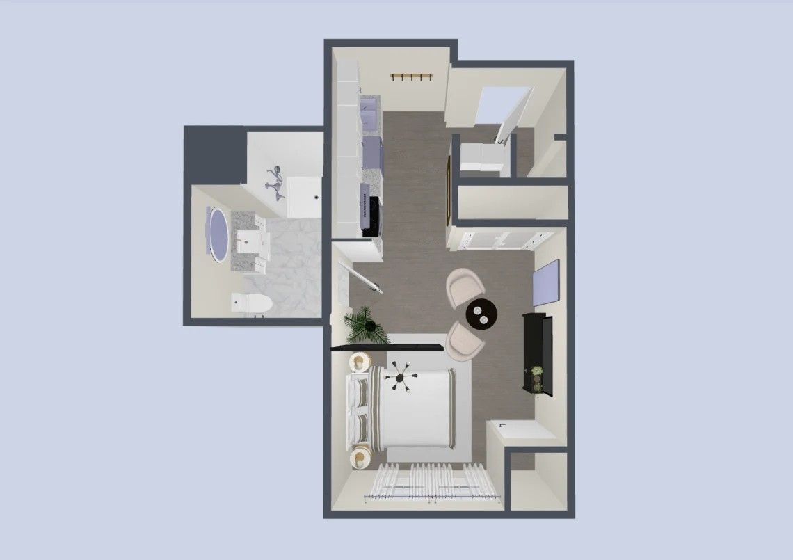 Floor plan of a studio apartment, featuring a bathroom, kitchenette, living area, and a bed.