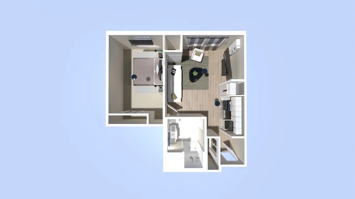 Overhead view of a studio apartment floor plan with a bedroom, living area, and kitchen layout.