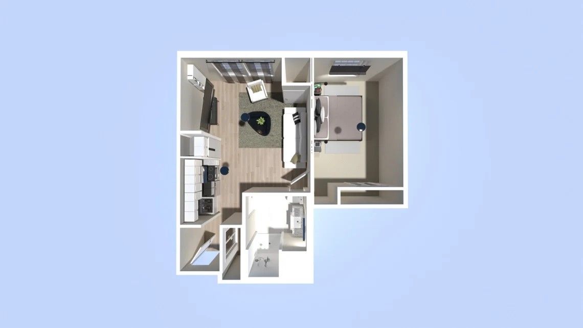 Floor plan of a small apartment: kitchen, living area with furniture, bedroom, and bathroom.