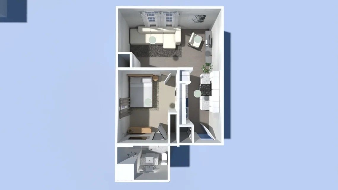 Floor plan of a small apartment: bedroom, living area with sofa, kitchen, bathroom, and a small balcony.