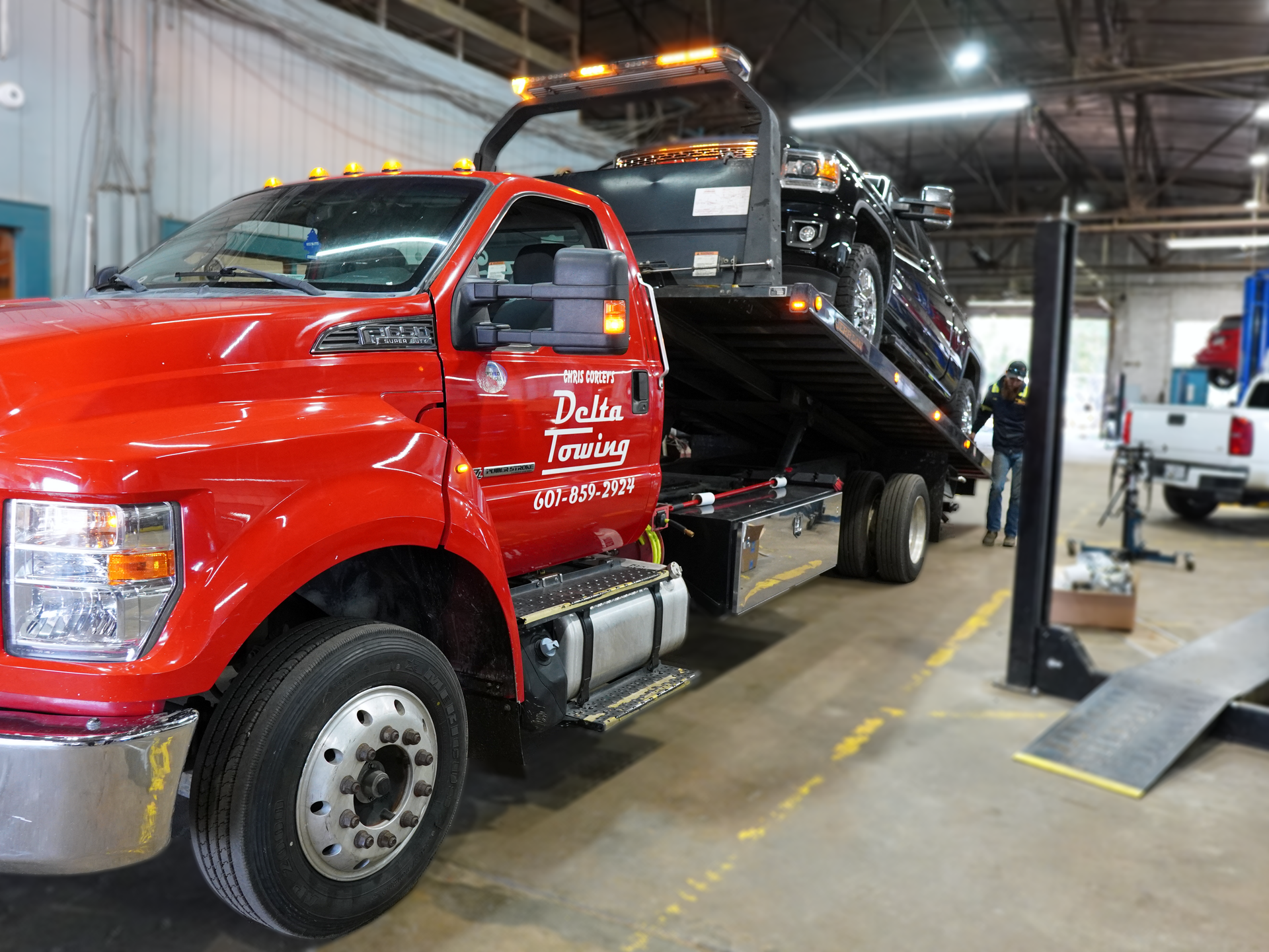 Vehicle attached to a towing truck | Delta Towing