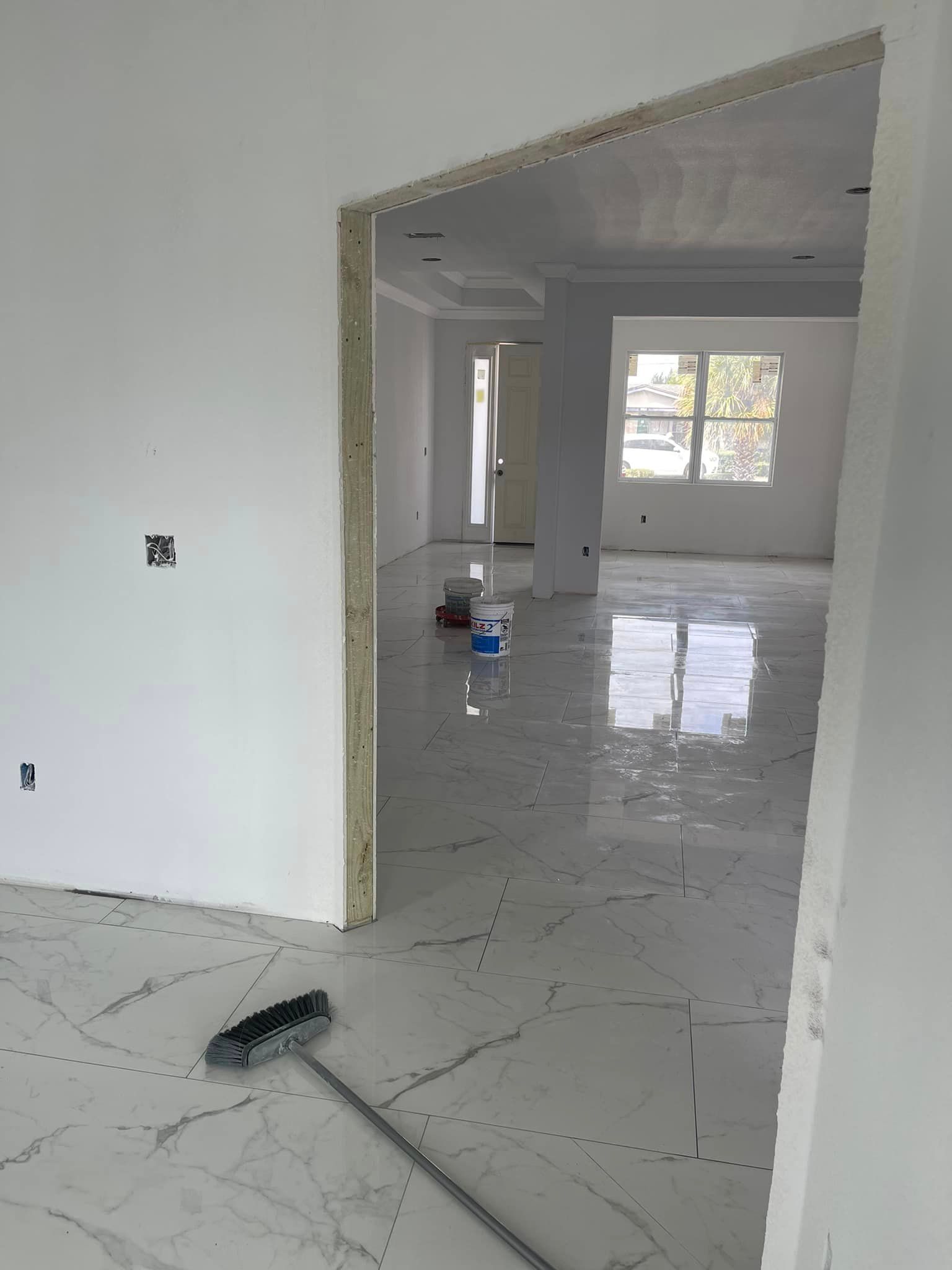 Broom is sitting on the Floor - Tampa, FL - Amnier Flooring