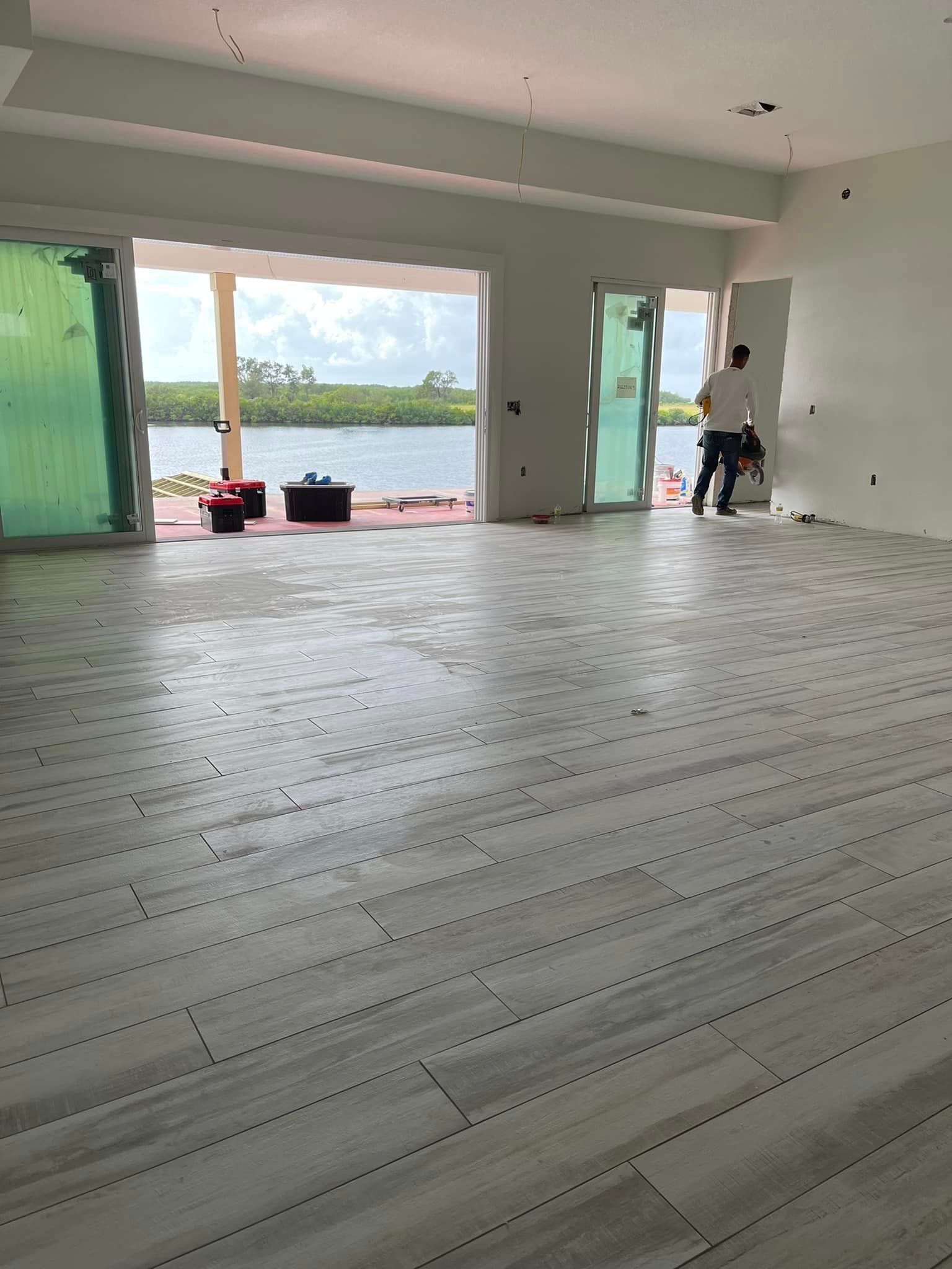 Man is standing in Room - Tampa, FL - Amnier Flooring