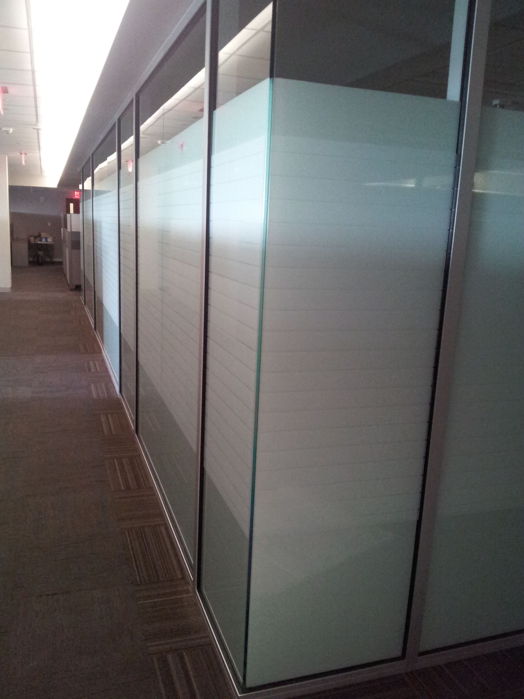 Solar Shield Roller Shade installed on angle toped windows in a great room