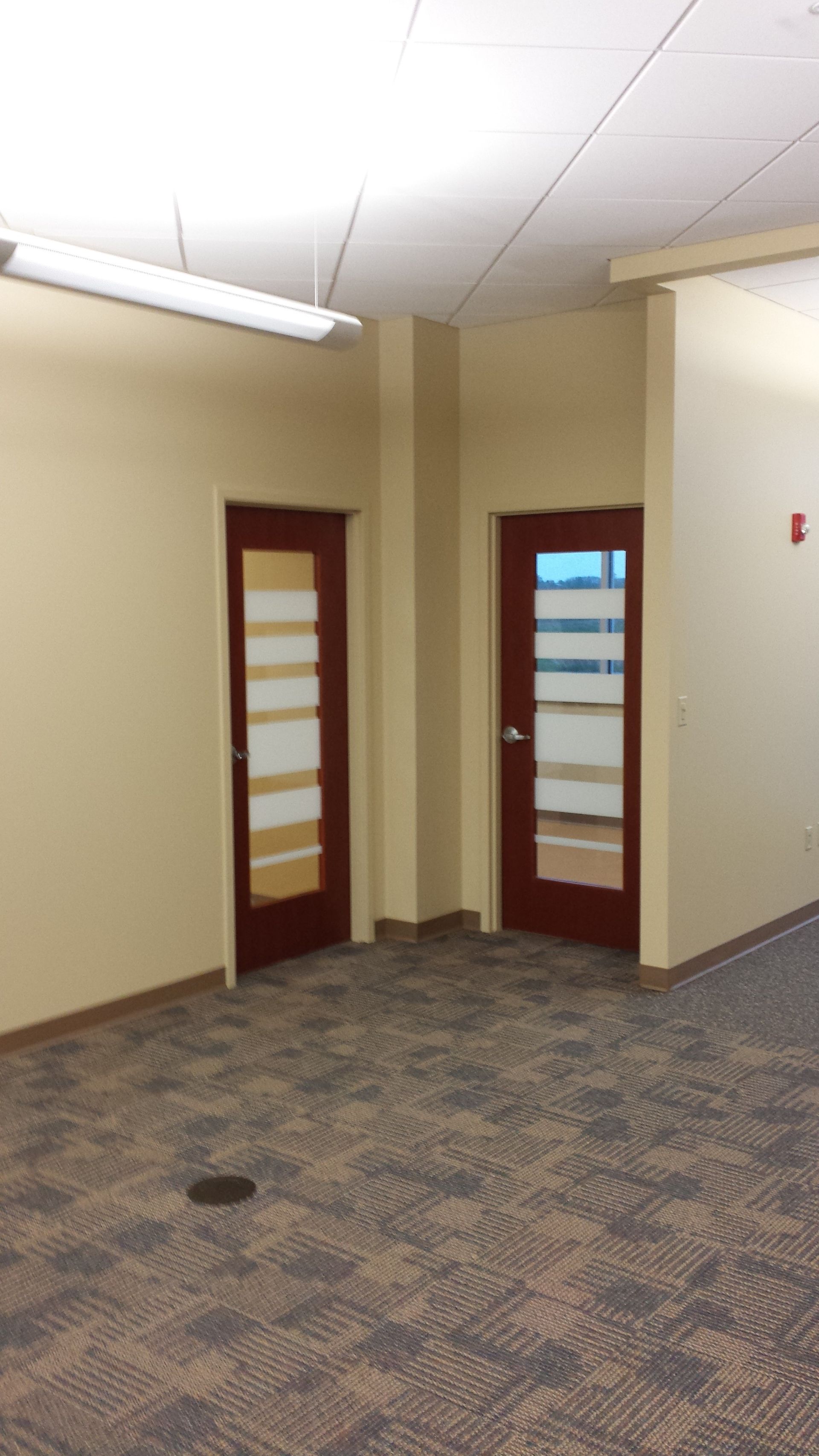 Solar Shield Roller Shade installed in a commercial office space. Lobby shades.