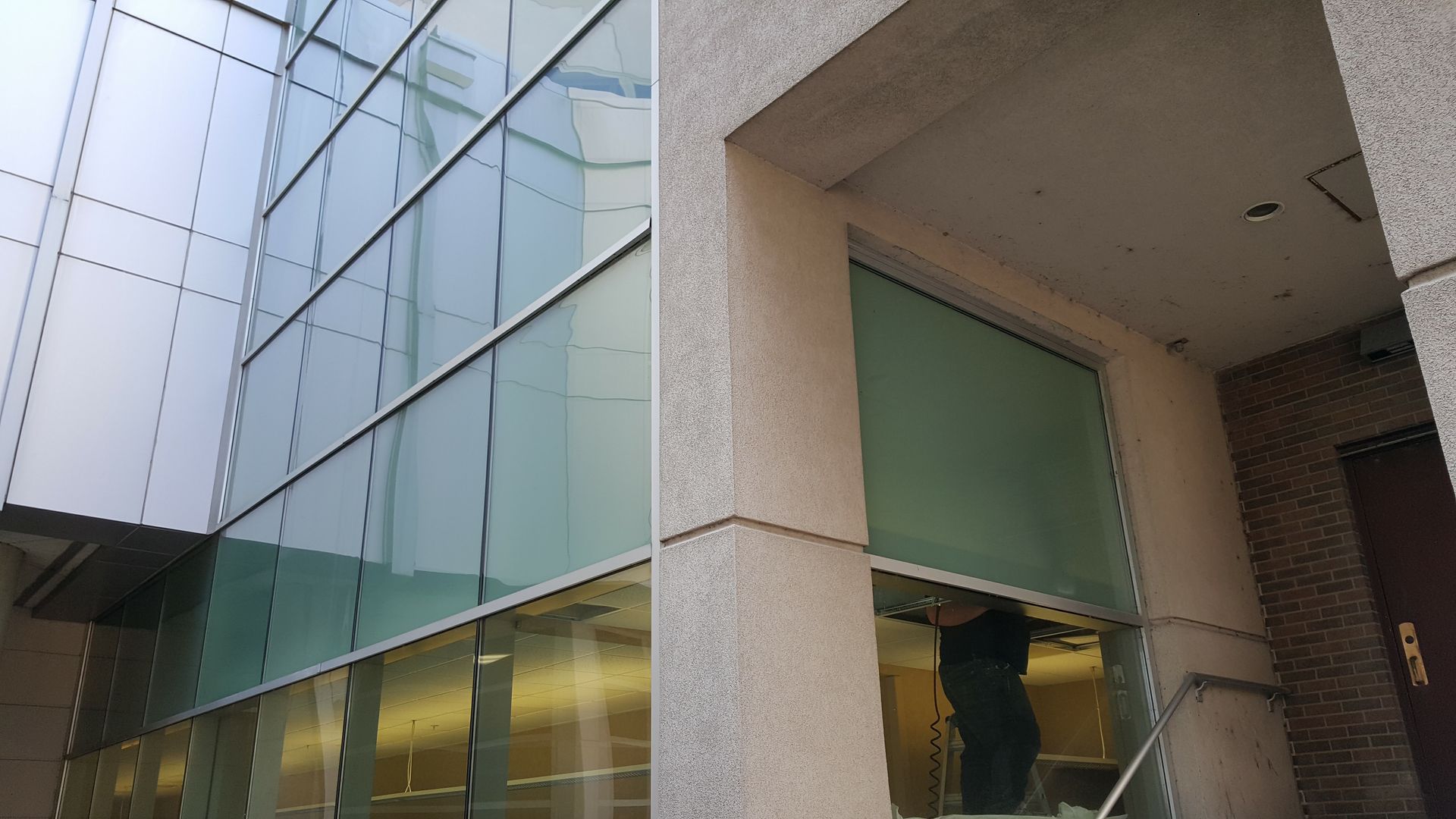 Solar Shield Roller Shade installed over a tall stairwell with hard to reach windows