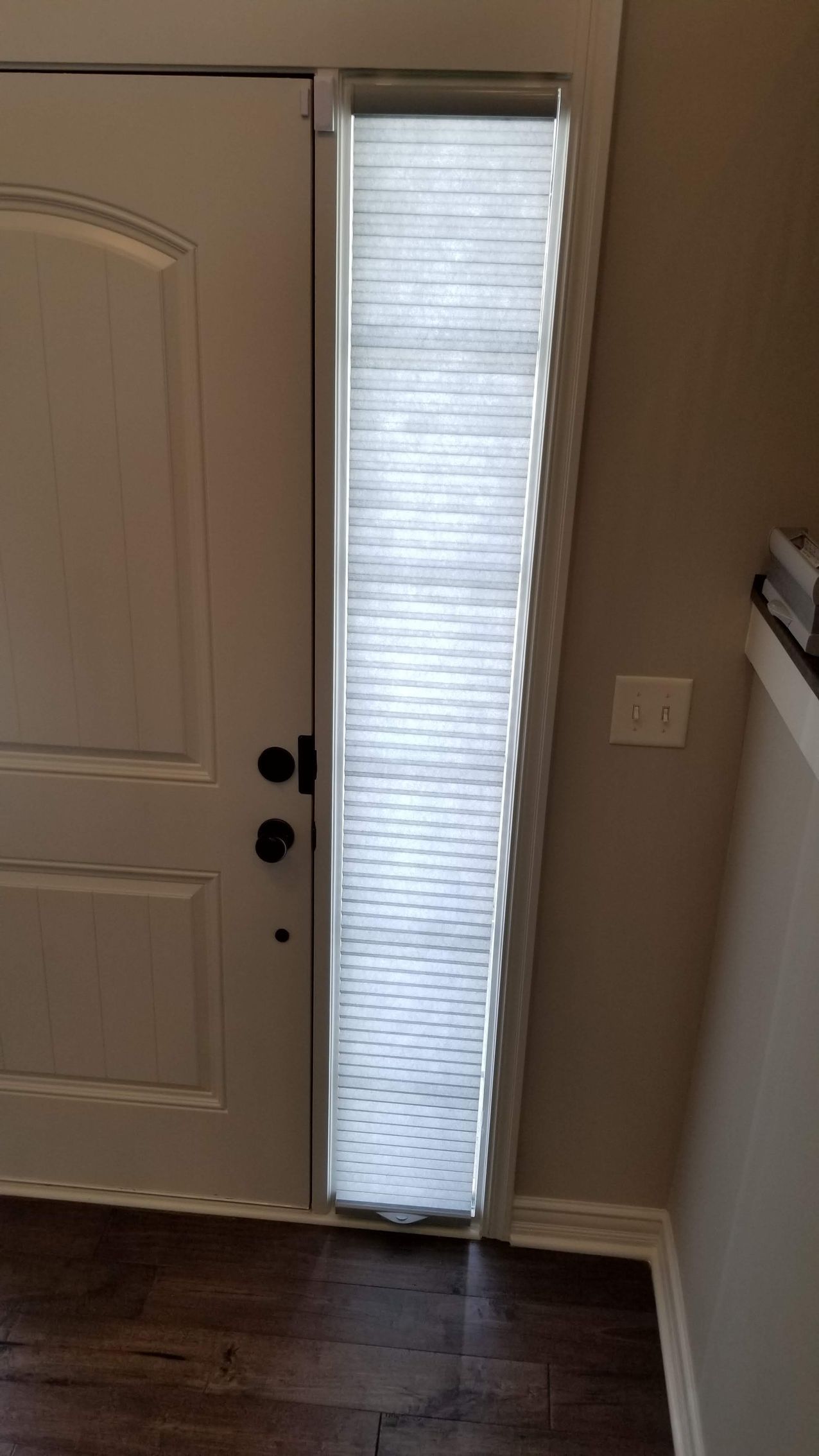 Solar Shield Roller Shade installed in a commercial business space. Lobby shades