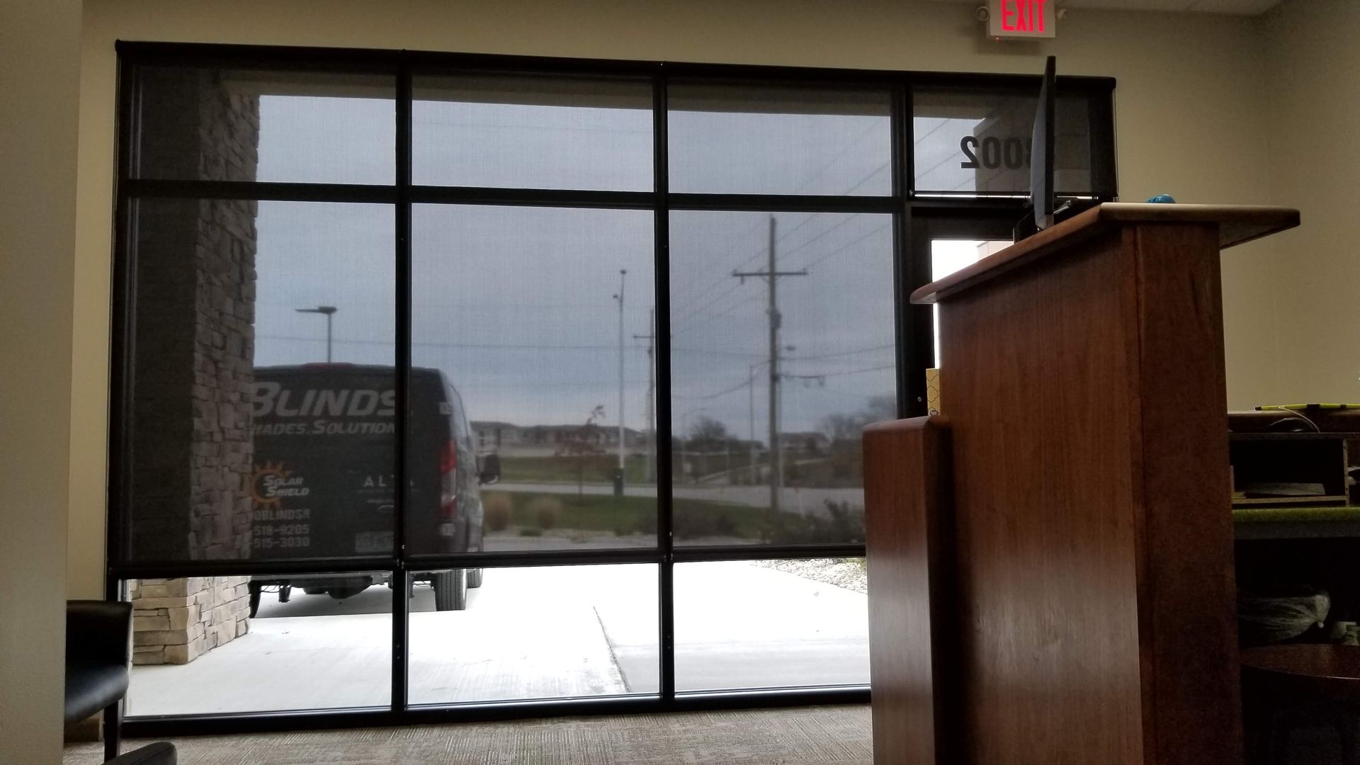 Solar Shield Roller Shade installed in a commercial office space. Lobby shades.