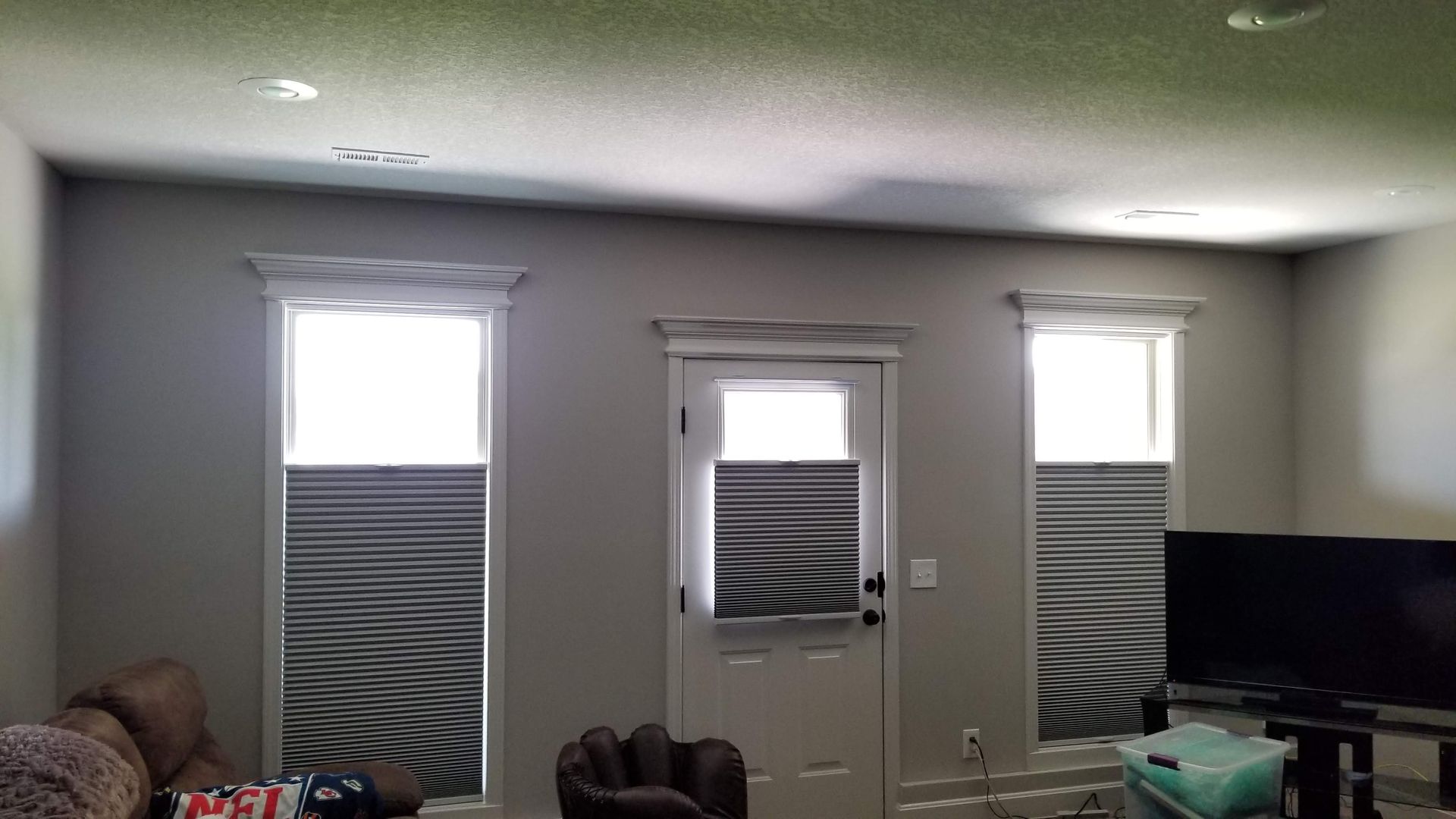 Solar Shield Roller Shade installed on angle top windows in a home on Lake Viking, MO