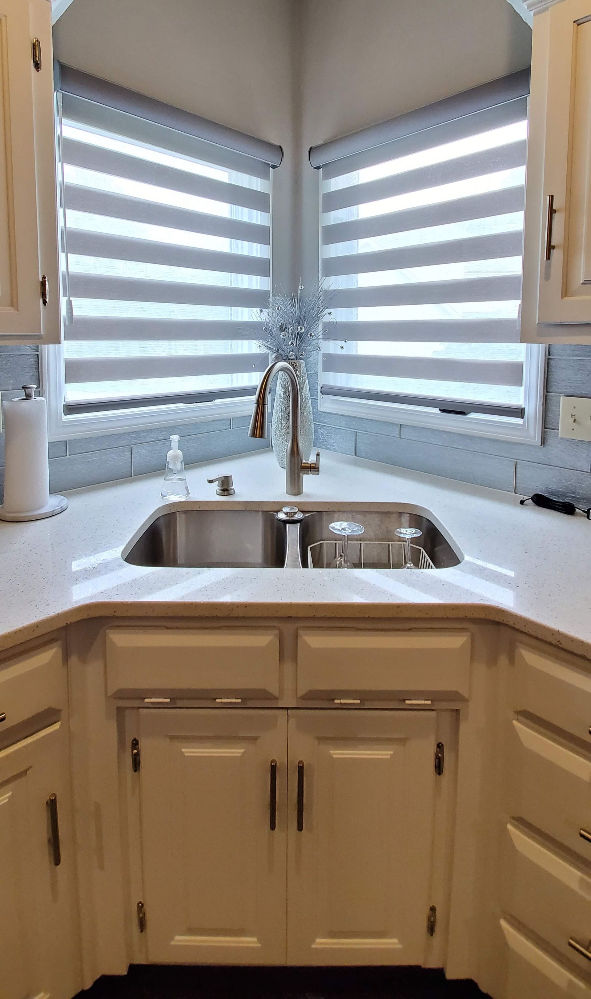 Solar Shield Banded Shades installed over kitchen sink on windows in Kansas City