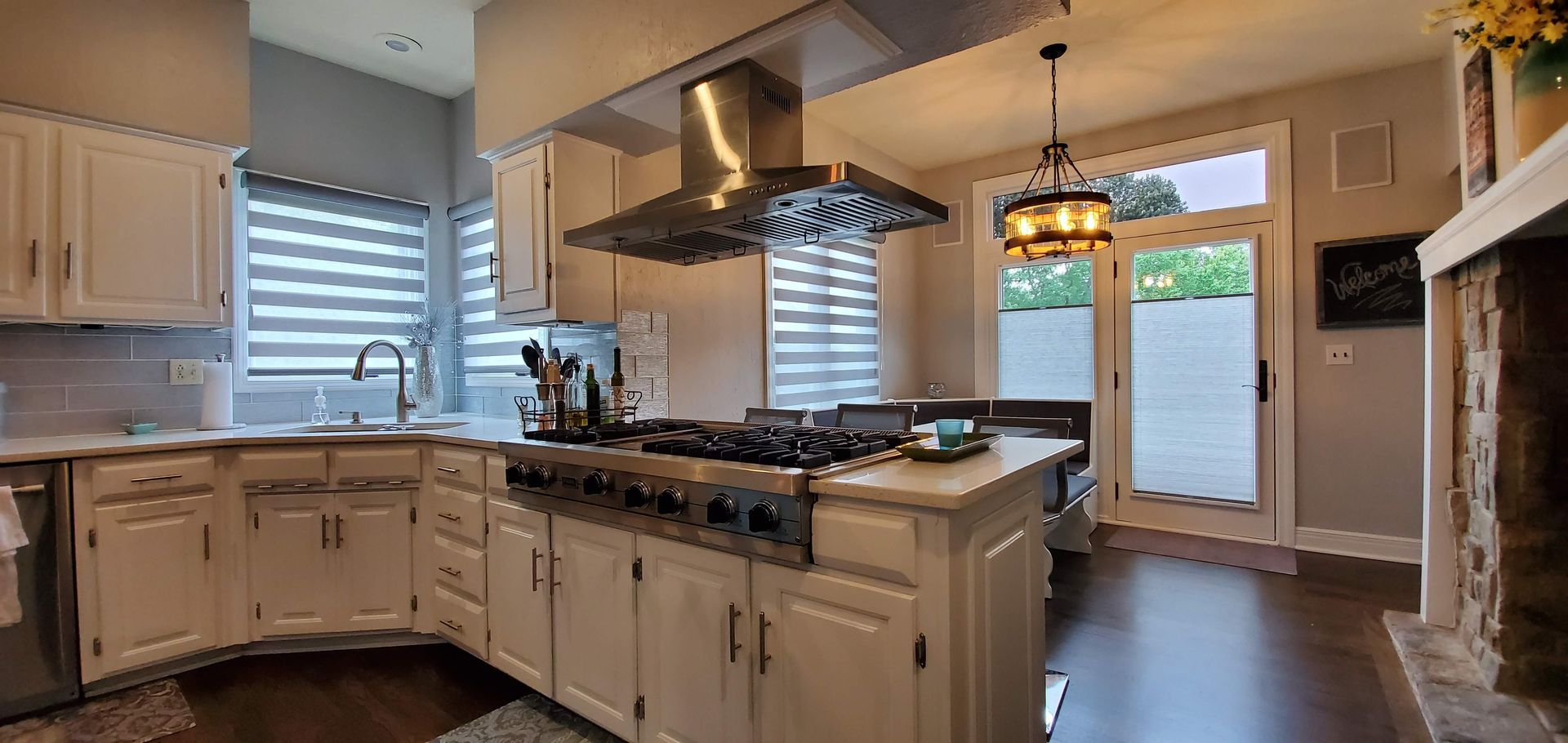 Solar Shield Shades installed in kitchen. Banded Shades & Honeycomb Shades