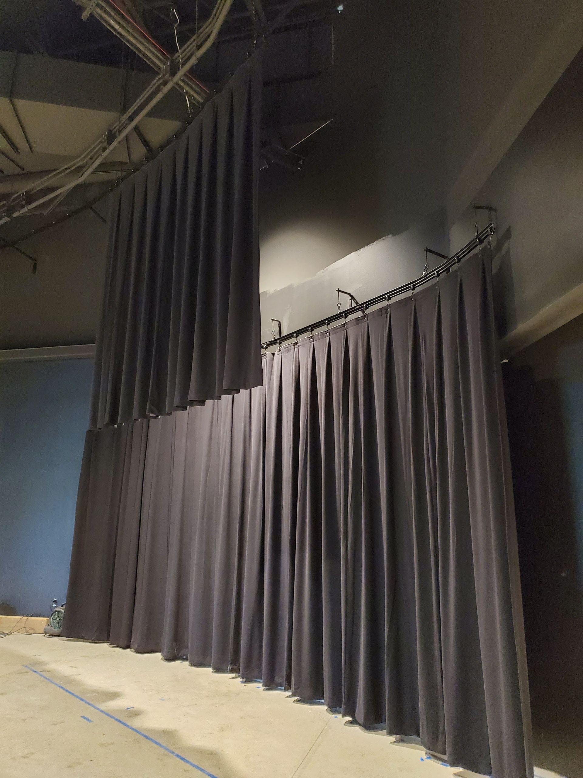 Solar Shield Stage Curtains back curtains mid install Kansas City
