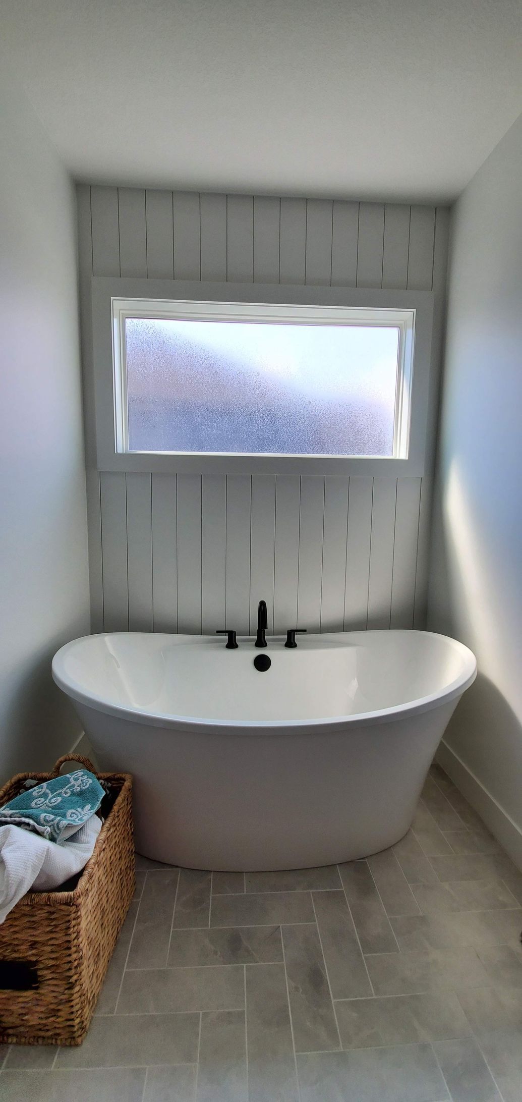 Solar Shield Roller Shade and Panel Track installed in a kitchen