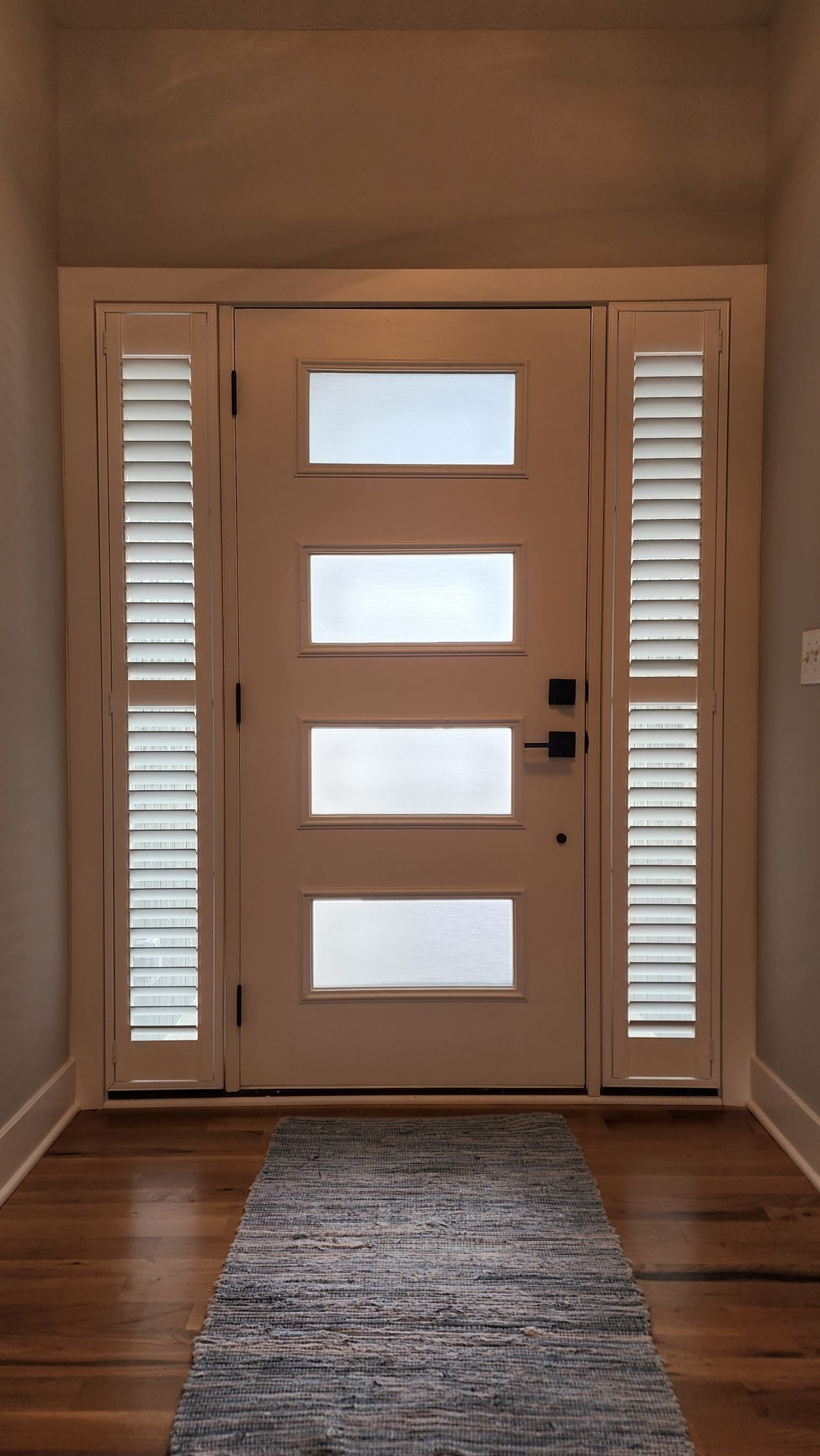 Solar Shield Roller Shades installed in a stairwell