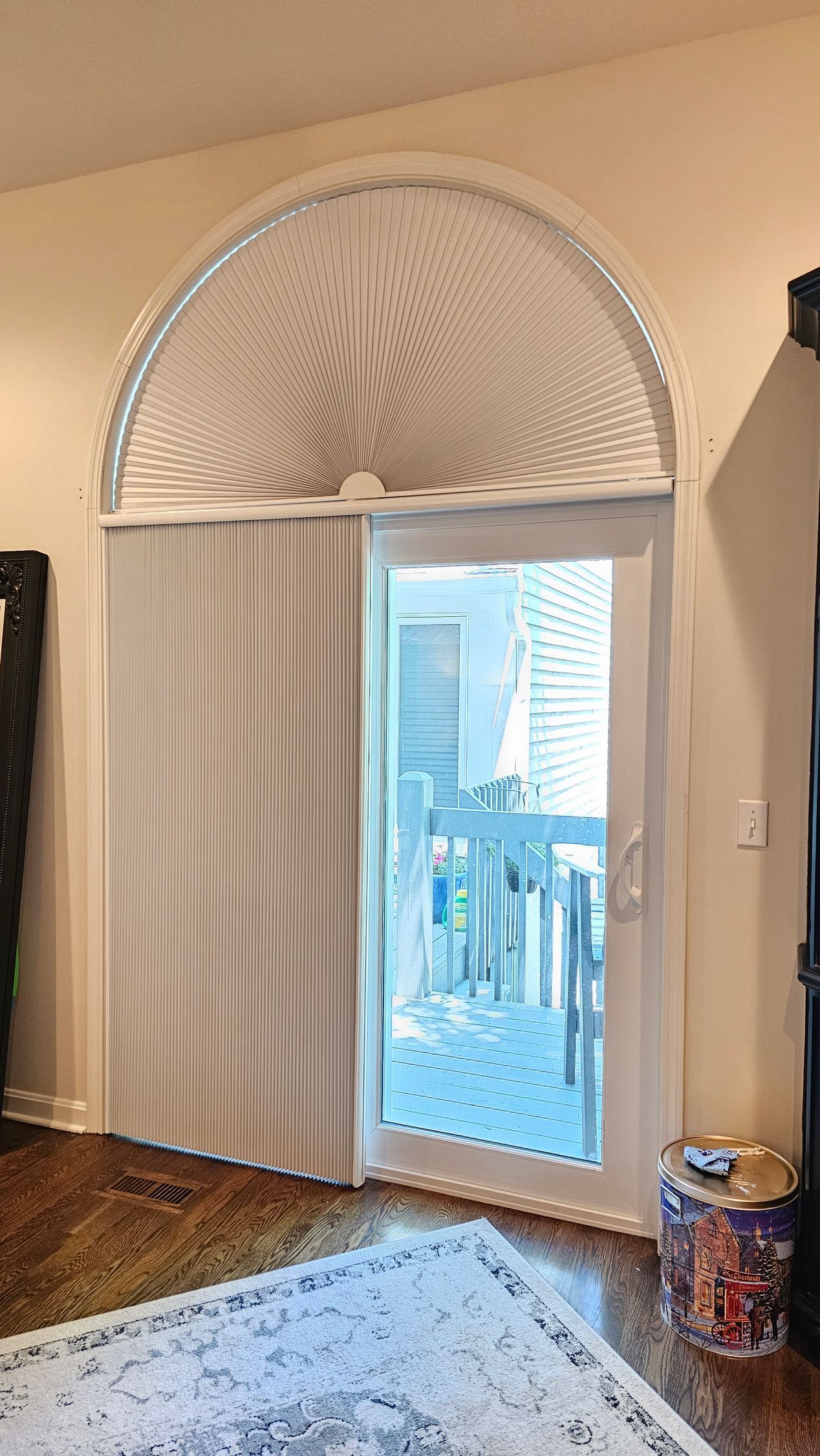 Solar Shield Honeycomb Shades arch shade and vertical honeycomb shade over patio door