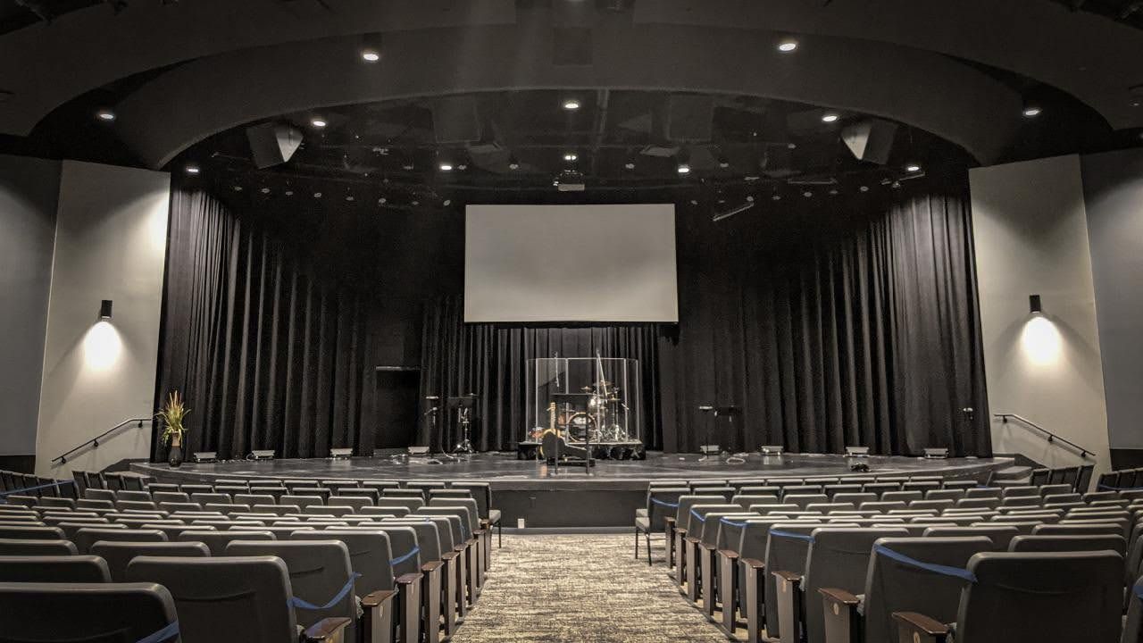 Solar Shield Stage Curtains installed in a church auditorium