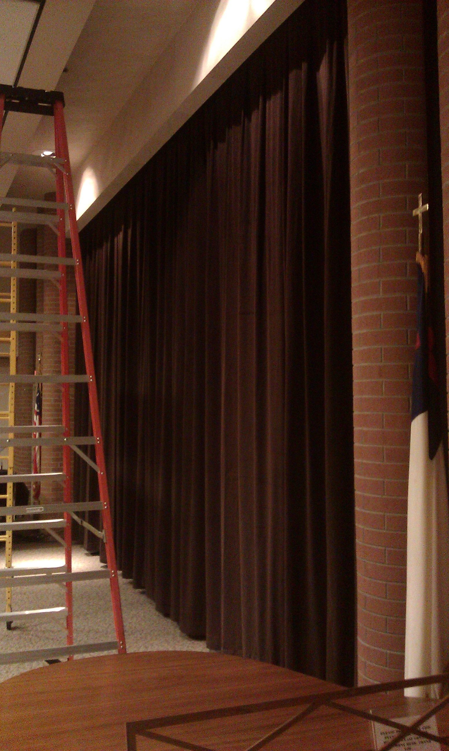 Solar Shield Stage Curtains installed in a retirement home community room
