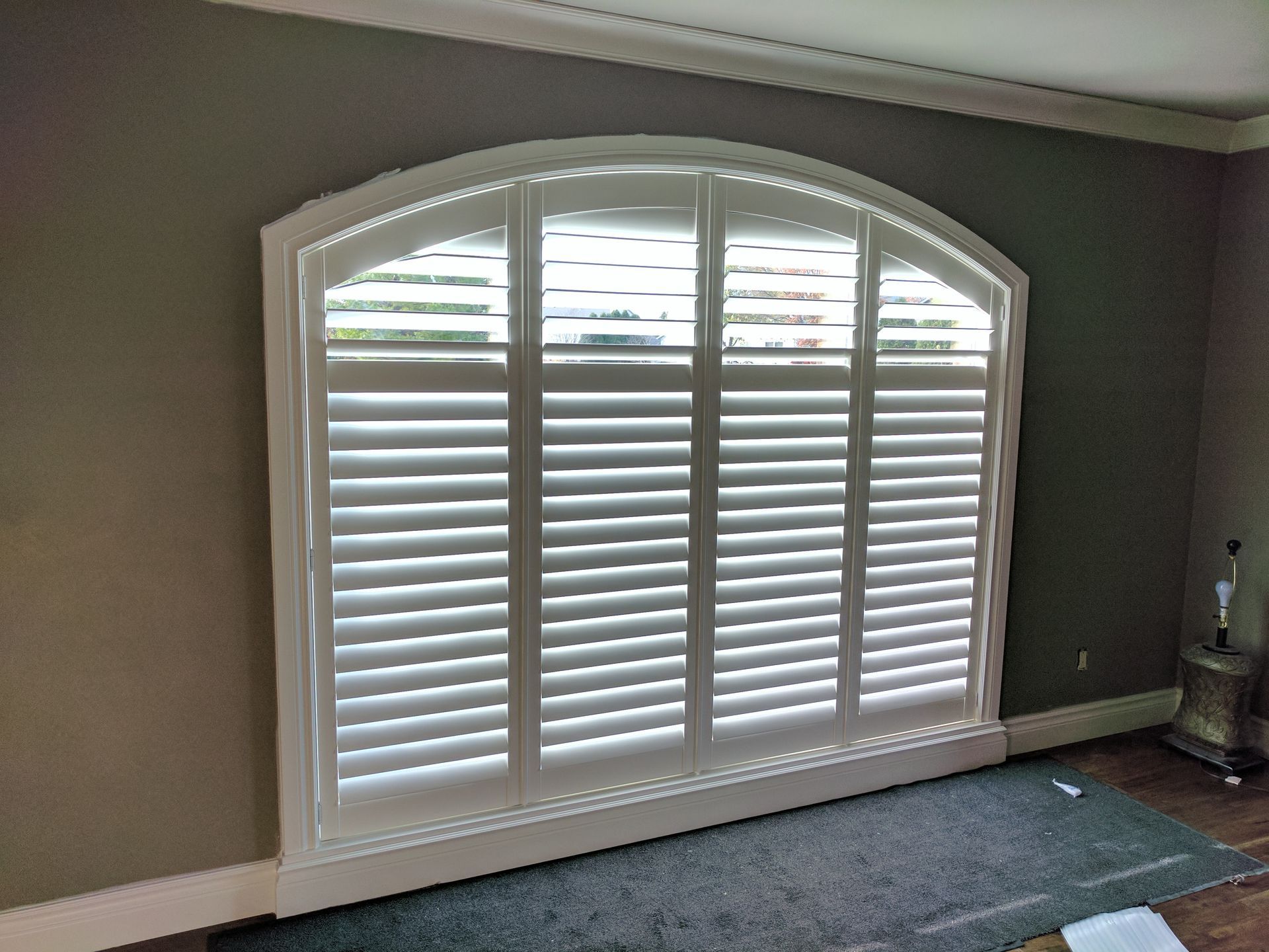 Solar Shield Roller Shade installed in a commercial business space. Lobby shades