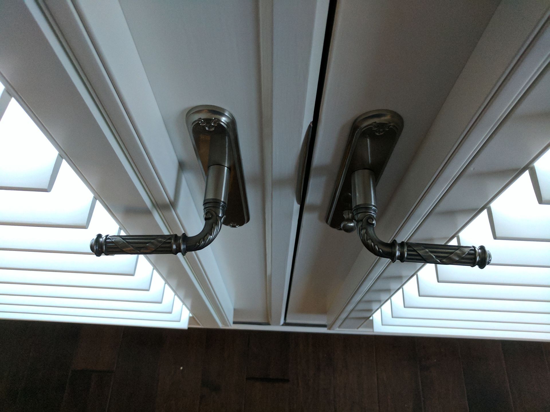 Solar Shield Roller Shade and Panel Track installed in a kitchen