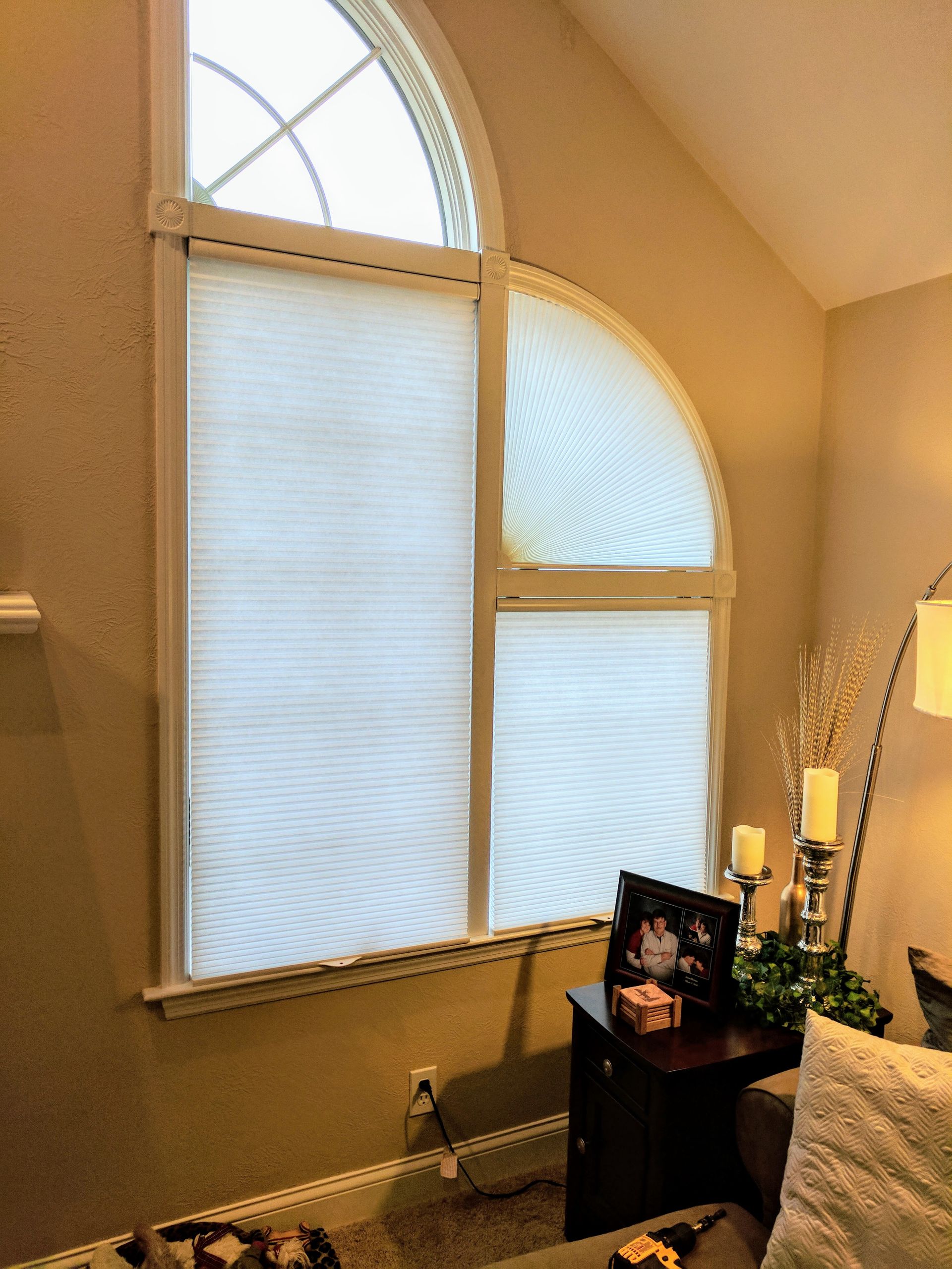 Solar Shield Honeycomb Shades installed on quarter circle window